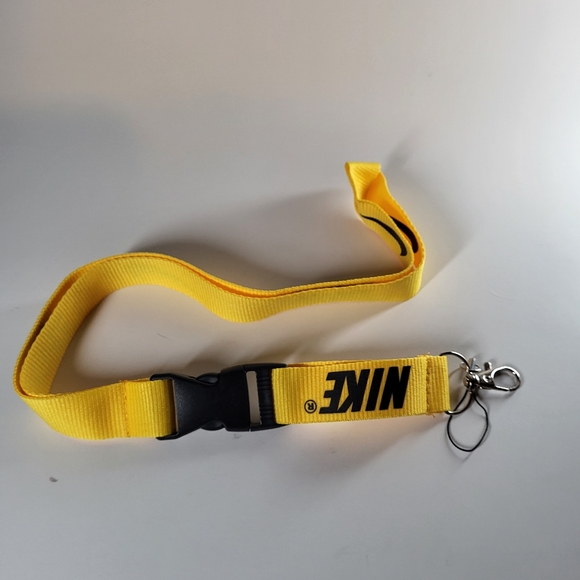 yellow nike keychain